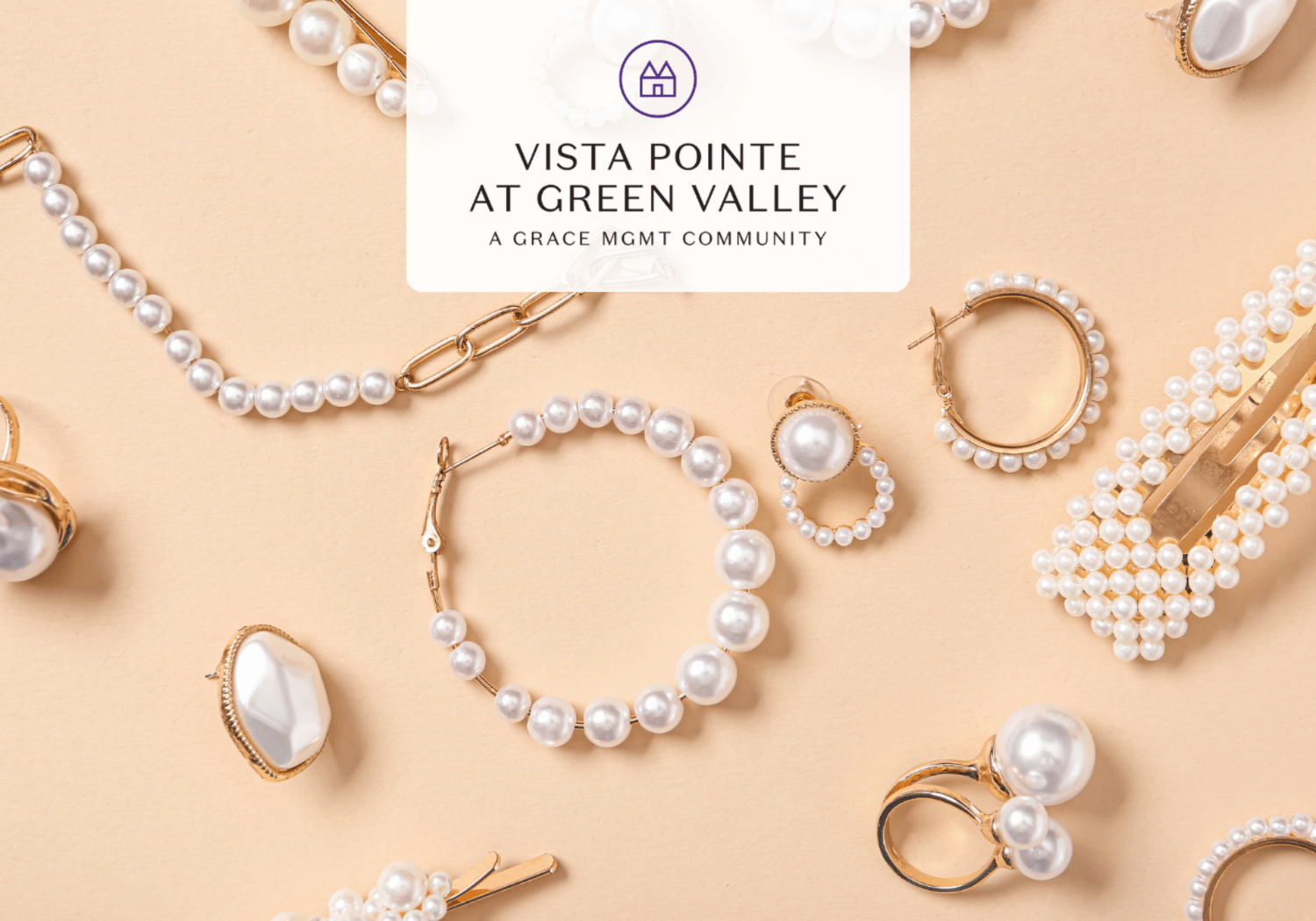 Logo for Vista Pointe at Green Valley atop a white card, surrounded by pearl jewelry on a peach background (wallflower aesthetic).